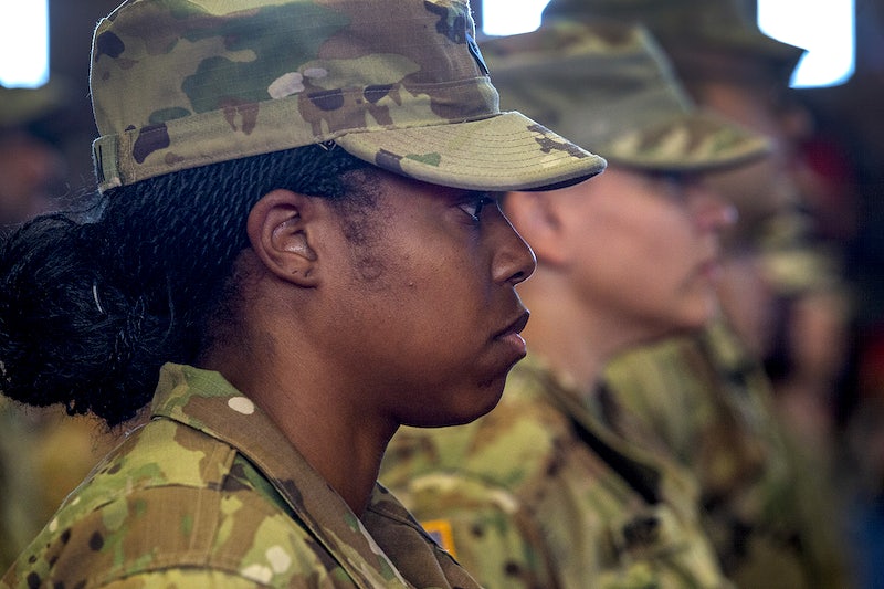 female soldiers- U.S. Army Soldiers with the 2nd Battalion, 113th Infantry Regiment, New Jersey Army National Guard, listen to U.S. Rep. Josh Gottheimer of New Jersey during the welcome home ceremony for the 268 New Jersey Army National Guard Soldiers at the National Guard Armory in Teaneck, N.J., Nov. 30, 2019. The Soldiers conducted a variety of missions, including base security, aircraft security, emergency response, intelligence collection, and security force assistance across a broad area of eastern Africa in support of Operation Enduring Freedom - Horn of Africa. (New Jersey National Guard photo by Mark C. Olsen). Original public domain image from Flickr